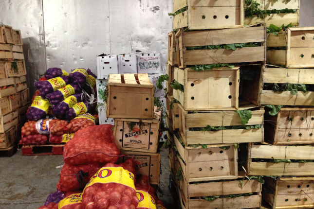 Crates of veggies in a warehouse